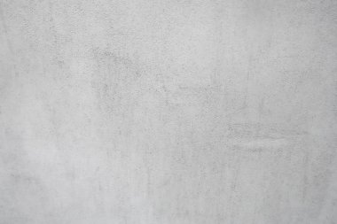 Arka planda hafif beton alçılı bir duvar var. Duvar kâğıdı ve tasarım için kullanılabilir                        