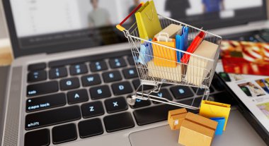 Renkli çanta ve kutularla dolu küçük bir alışveriş arabası akıllı telefon ve dizüstü bilgisayarın üzerinde duruyor. 3d, görüntüleme, illüstrasyon,