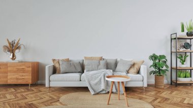 A modern, cozy living room with a minimalist design, featuring a comfortable white sofa, natural wooden furniture, and various decorative plants in a neutral, textured setting clipart