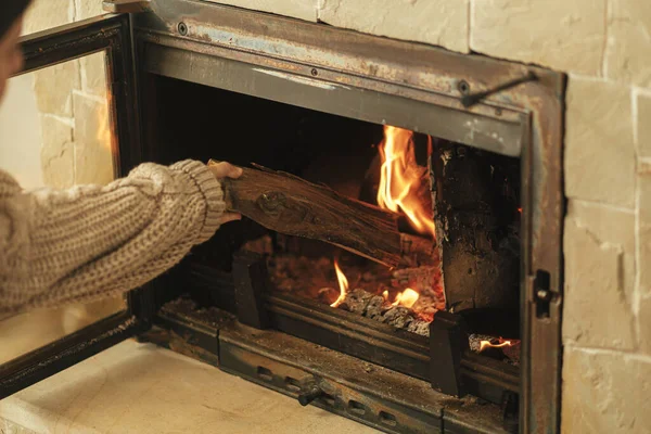 Woman Putting Firewoods Burning Fireplace Rustic Room Farmhouse Heating House — Stock Photo, Image