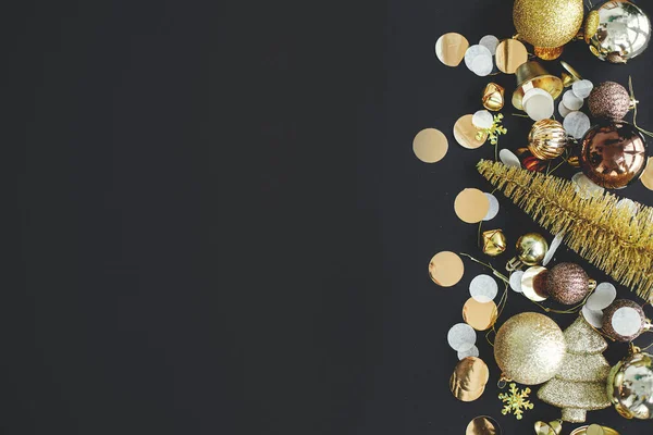 Modern Christmas Flat Lay Golden Baubles Confetti Decorations Black Background — Stock Fotó