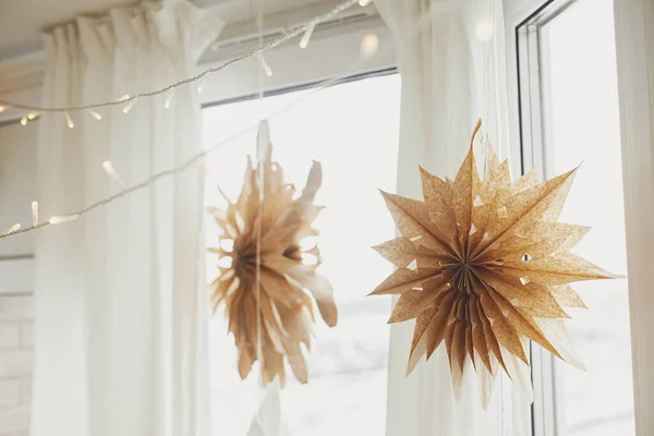 Stylish Paper Christmas Stars Lights Hanging Window Festive Decorated Boho — 스톡 사진