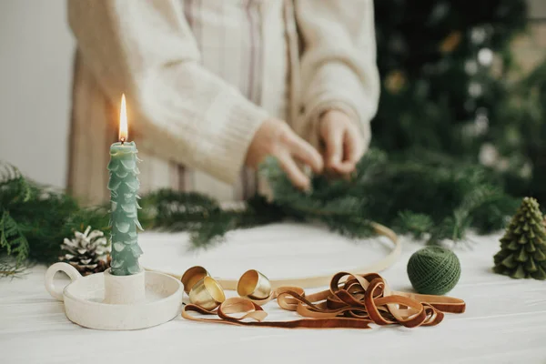 Making Christmas Modern Wreath Stylish Candle Fir Tree Golden Bells — Stock Photo, Image