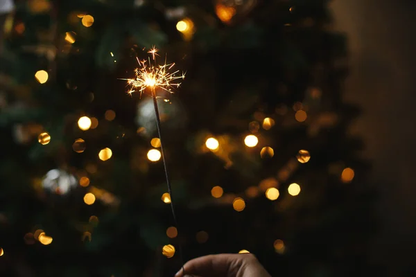 Hand Holding Firework Christmas Tree Lights Dark Room Happy New — Stock Photo, Image