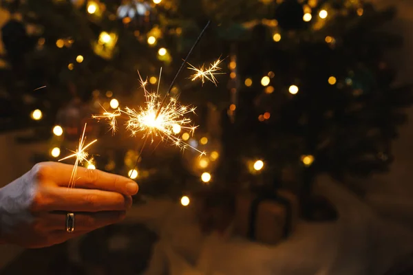 Hand Holding Firework Stylish Decorated Tree Illumination Happy New Year — Stock Photo, Image