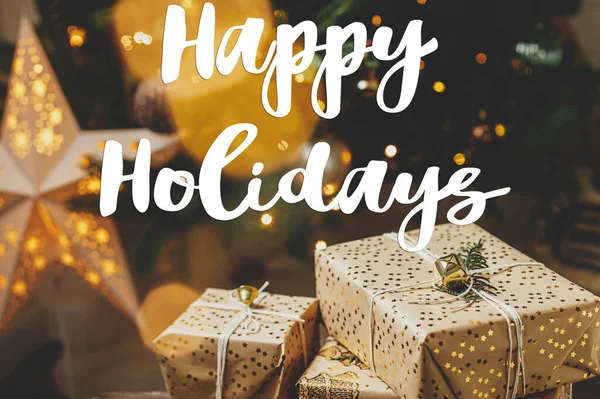 Happy Holidays Text Sign Stylish Christmas Gifts Christmas Tree Golden — Stock Photo, Image