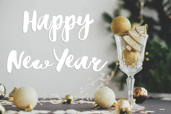 Happy New Year Text Sign Golden Glitter Baubles Champagne Glass — Stock Photo, Image