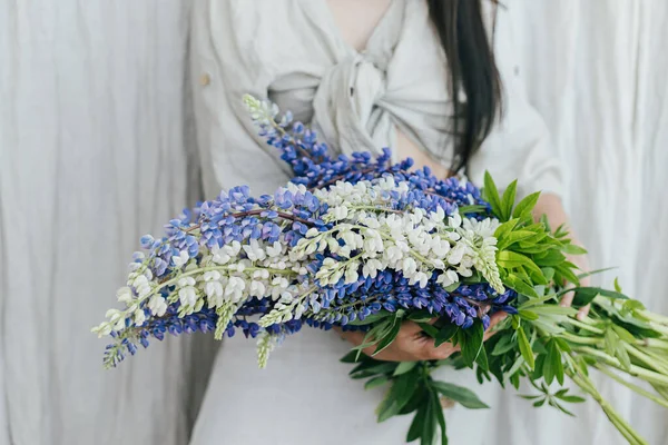 Stylish Woman Holding Lupine Bouquet Rustic Room Close Gathering Arranging — стоковое фото