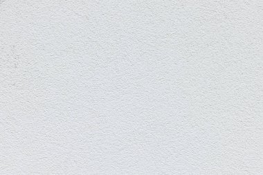 Alçı duvar arkaplanı kapanıyor. Evin dış dekorasyonu, beyaz alçı duvar dokusu. Ön cephe gelişimi