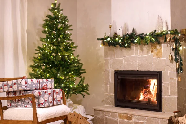 Stylish Wrapped Christmas Gifts Arm Chair Christmas Tree Festive Lights — Stock Photo, Image