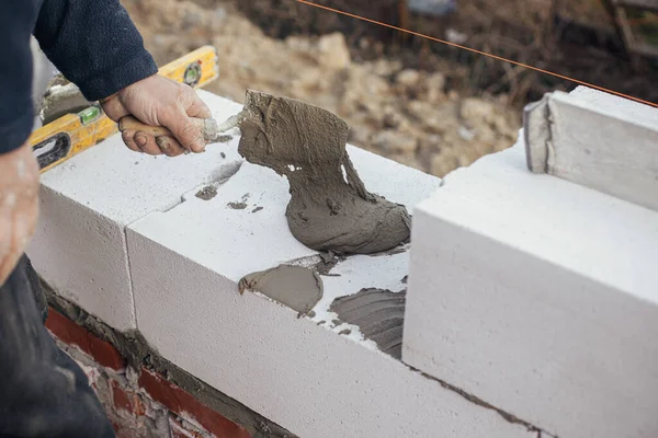 Worker Laying Autoclaved Aerated Concrete Blocks Working Adhesive Trowel Builder — Stock Photo, Image