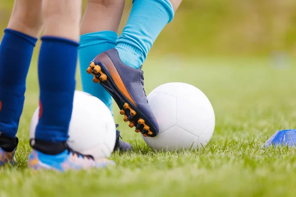 stock image Soccer Football Training Background. Footballers with Soccer Balls on Training Field. Sports Players in Football Cleats Practicing Dribbling Skills