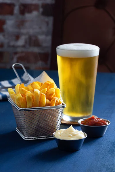 Golden French Fries Wire Basket Pilsner Lager Beer Ketchup Mayonnaise Royalty Free Stock Images