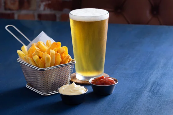 Golden French Fries Wire Basket Pilsner Lager Beer Ketchup Mayonnaise Royalty Free Stock Photos