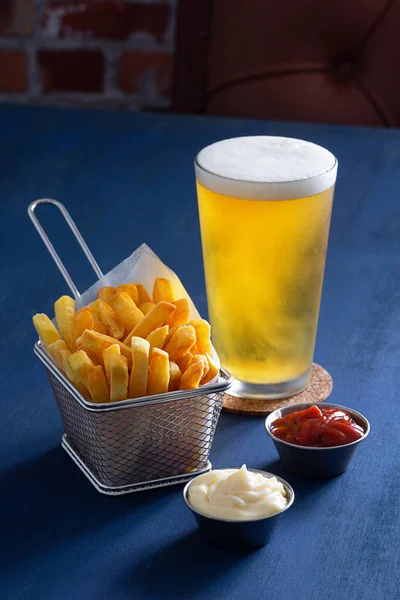 Golden French Fries Wire Basket Pilsner Lager Beer Ketchup Mayonnaise Stock Picture