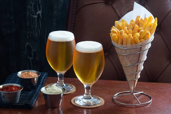 Golden French Fries Wire Cone Two Belgian Beers Ketchup Mayonnaise Stock Image