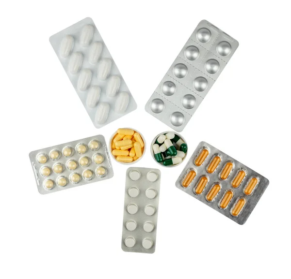 白い背景に異なる錠剤 カプセルのセット — ストック写真