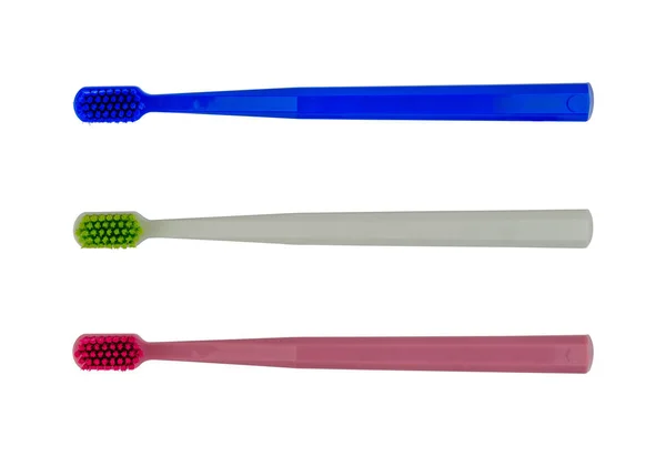 Novas Escovas Dentes Vermelho Branco Azul Isolado Vista Superior — Fotografia de Stock