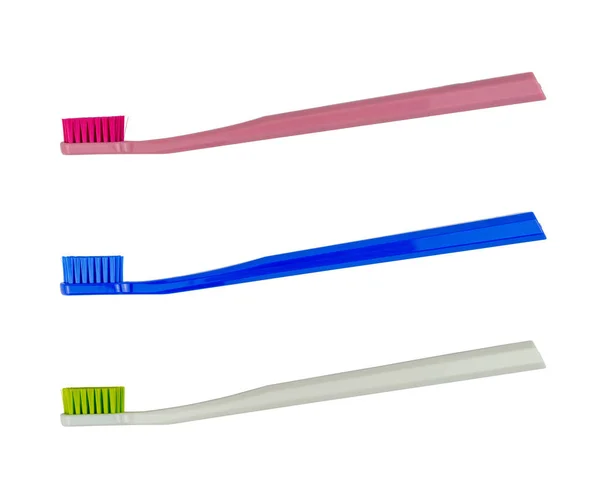 Novas Escovas Dentes Vermelho Branco Azul Isolado Vista Lateral — Fotografia de Stock
