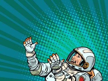 Erkek astronot, eller yukarı. Bilim ve uzay keşfi. Uzay giysisi giymiş bir adam. Pop Art retro karikatür klasikleri 50 'lerin modası 60' ların tarzı