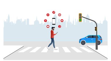 Karşıdan karşıya geçerken cep telefonunu kullanmayın.Uygulama simgeleriyle çevrili akıllı bir telefona odaklanırken caddeden geçen yayalar, arka planda bir trafik ışığı ve şehir manzarası beklerken, cep telefonlarını kullanmayın.