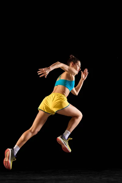 Back View Sportive Muscled Woman Professional Runner Running Away Isolated — Stock Photo, Image