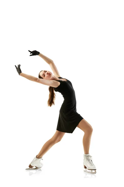 柔韧的少女形象 身穿黑色舞台服的女子花样滑冰选手被白色背景隔离 年轻运动员在运动 冬季运动 广告的复制空间 — 图库照片