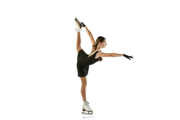 Junges Teenie Mädchen Eiskunstläuferin Schwarzem Bühnenkostüm Vereinzelt Vor Weißem Hintergrund — Stockfoto