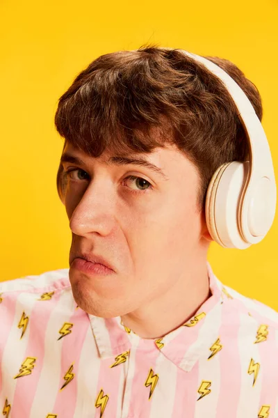 Grimace Closeup Portrait Emotive Young Man Headphones Smiling Listening Music — Stock Photo, Image