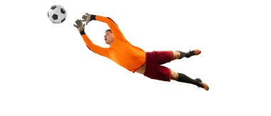 Dynamic portrait of professional soccer goalkeeper in sports uniform jumping and catching football ball isolated over white background. Concept of sport, action, motion, goals.