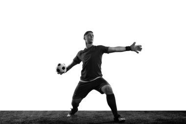 Black and white portrait of male soccer football goalkeeper psoing isolated over white background. Monochrome. Concept of active sport, action, motion, goals and ad