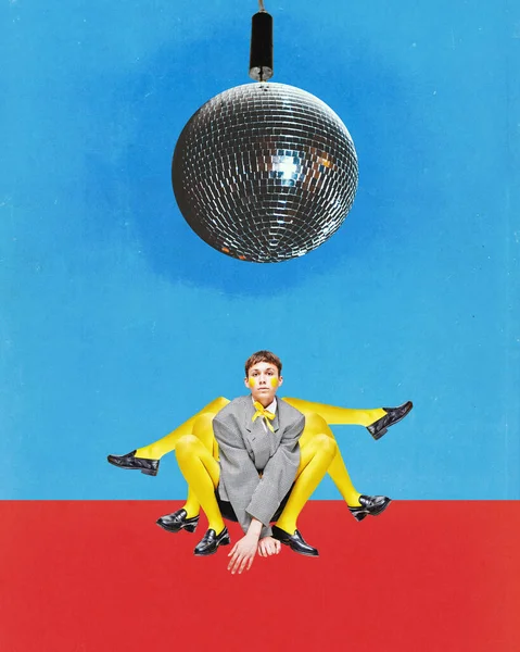 Weird man with a lot of legs sitting like spider under disco ball with serious facial expression over blue background. Contemporary art collage. Party, disco, retro, vintage, ad concept