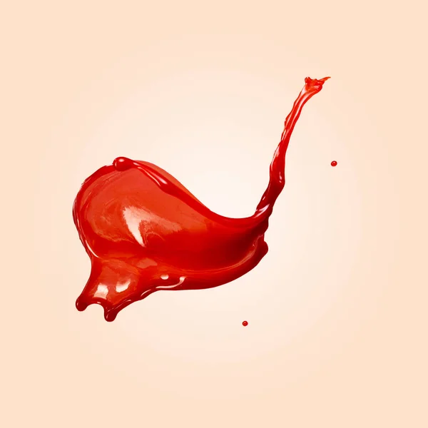 Levitating red splash and wave with drops isolated on beige background. Liquid paint, color explosion concept. Main trends in modern design. Concept of textures, colors, palette, products, freedom. Ad