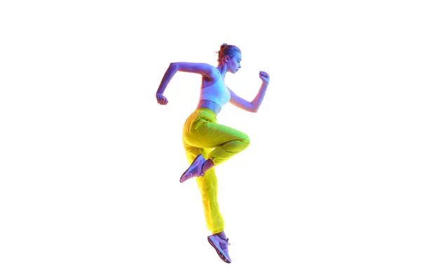 Spor Yaparken Poz Veren Koşar Gibi Zıplayan Moda Spor Kıyafetleri — Stok fotoğraf