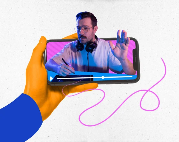 Modern aesthetic artwork. Hand holding phone with man, blogger sitting with tablet in headphones and raising hand. Concept of video and podcast streaming services and social media. Ad