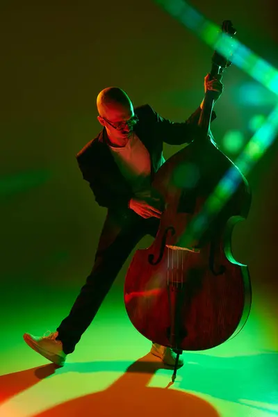 Talented Cellist Performing Jazz Compositions Red Green Neon Light Gradient Stock Picture