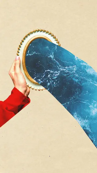 stock image Contemporary art. collage. Hand in red sleeve holding mirror revealing ocean waves against paper background. Concept of natural beauty, self-love, world, creativity, inspiration.