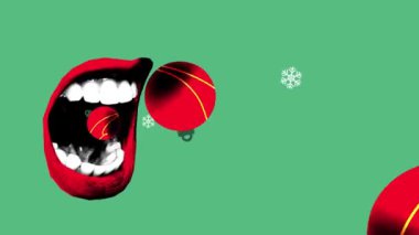 Hareketi durdur. Animasyon. Kırmızı ağızlı, üç kırmızı takı, kar taneleri yavaşça yeşil arka plana düşerken. Kış tatili kavramı, Noel, şenlik havası, kutlama. Tebrik kartı.
