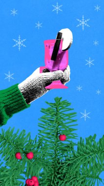 Contemporary art collage. Pink glass with whipped cream held above lush pine branch against snowy blue background. Concept of Christmas winter vibe, love, presents, festive mood. Ad clipart