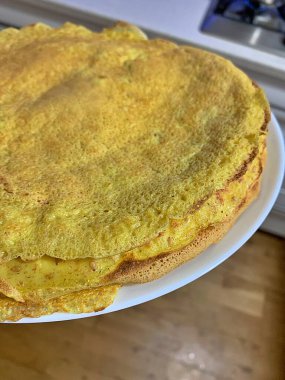 plate with fried pancakes, fresh yellow pancakes, flour product, homemade food, crispy pancakes