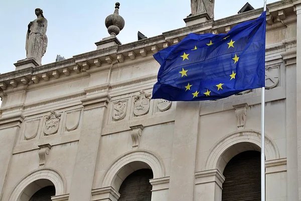 blue union flag, waving european union flag, historic building and flag on a pole, blue flag with yellow stars