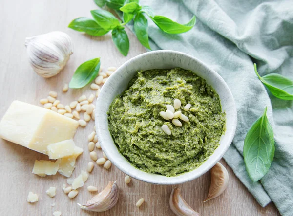 stock image Fresh made Pesto sauce. Green basil pesto.  Ingredient for pesto sauce - Fresh Basil, Pine Nuts, Olive Oil and Cheese