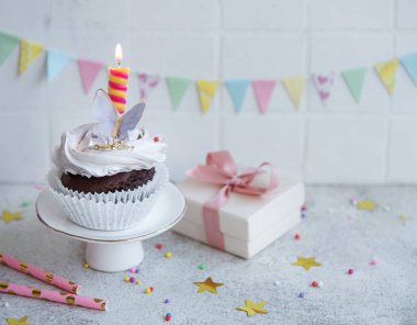 Birthday holiday sweet cupcakes with butterfly decorations