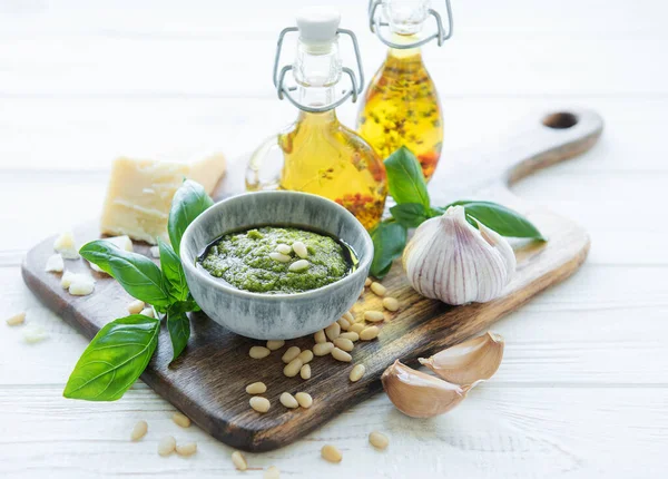 stock image Fresh made Pesto sauce. Green basil pesto.  Ingredient for pesto sauce - Fresh Basil, Pine Nuts, Olive Oil and Cheese