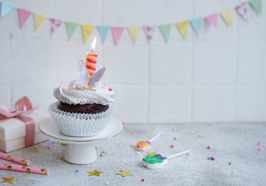 Birthday holiday sweet cupcakes with butterfly decorations