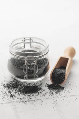 Jar of Hawaiian black  lava sea salt .  Healthy food concept. Speciality salt.