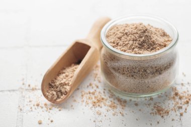 Jar of Hickory smoked  sea salt.  Healthy food concept. Speciality salt.