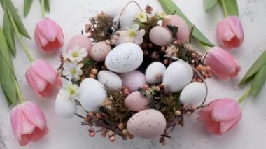Colorful Easter eggs  rotation. Happy Easter background. Top view Rotating Of wreath with Colorful Easter Eggs 