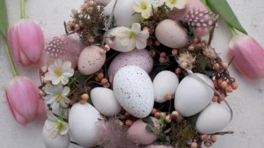 Colorful Easter eggs  rotation. Happy Easter background. Top view Rotating Of wreath with Colorful Easter Eggs 