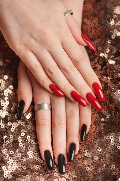 Hands Young Girl Red Black Manicure Nails Sequins Background — Zdjęcie stockowe